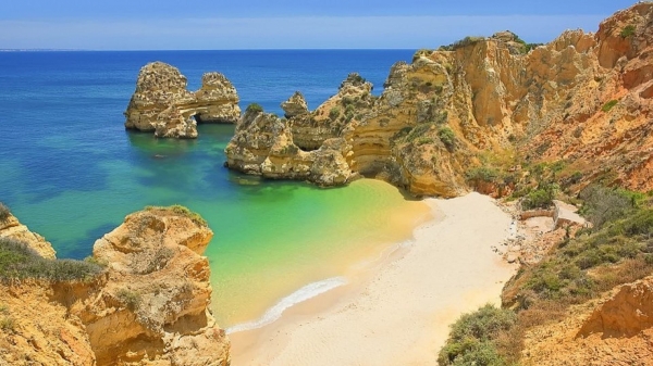 Beach and cliffs on the coast at Lagos, Algarve